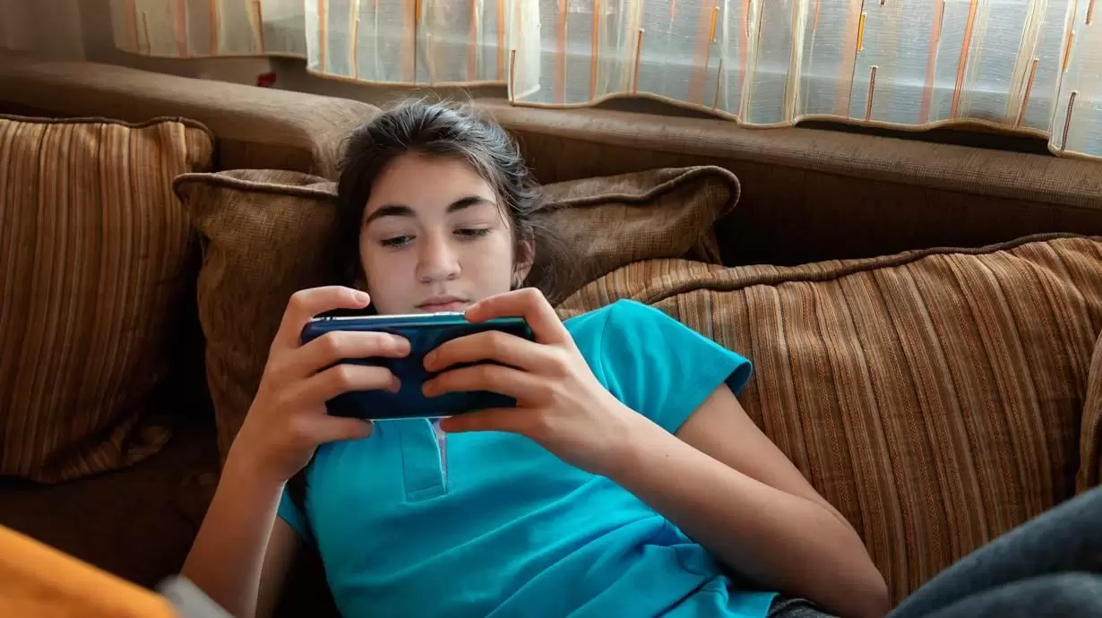 Teen Watching Video Content